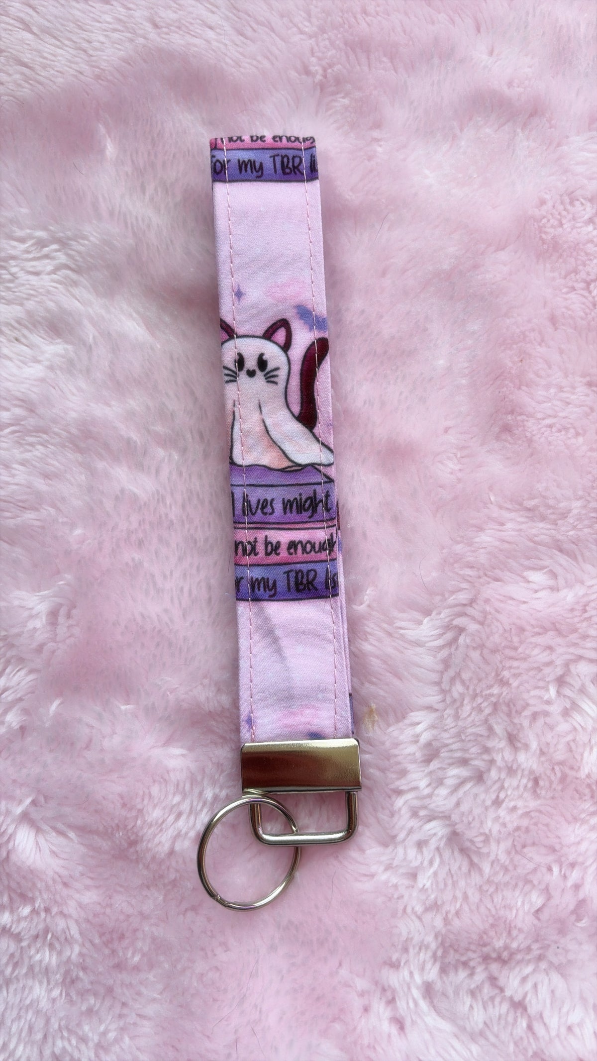 9 Lives Might Not Be Long Enough For My TBR Wristlet